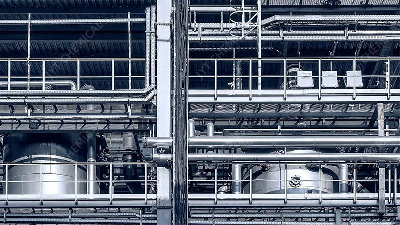 A state-of-the-art chemical manufacturing facility with clean pipes and tanks