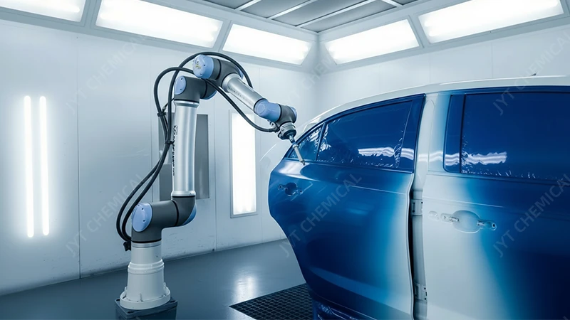 A robotic arm spraying a glossy, eco-friendly coating onto a car panel